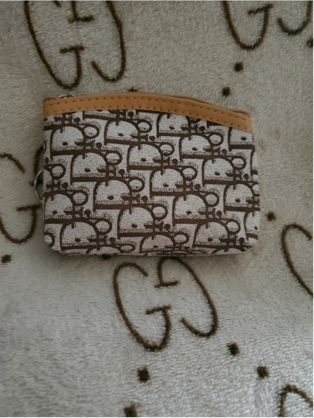 Brown patterned tan faux-leather trimmed coun or cosmetic bag 4.5 inches